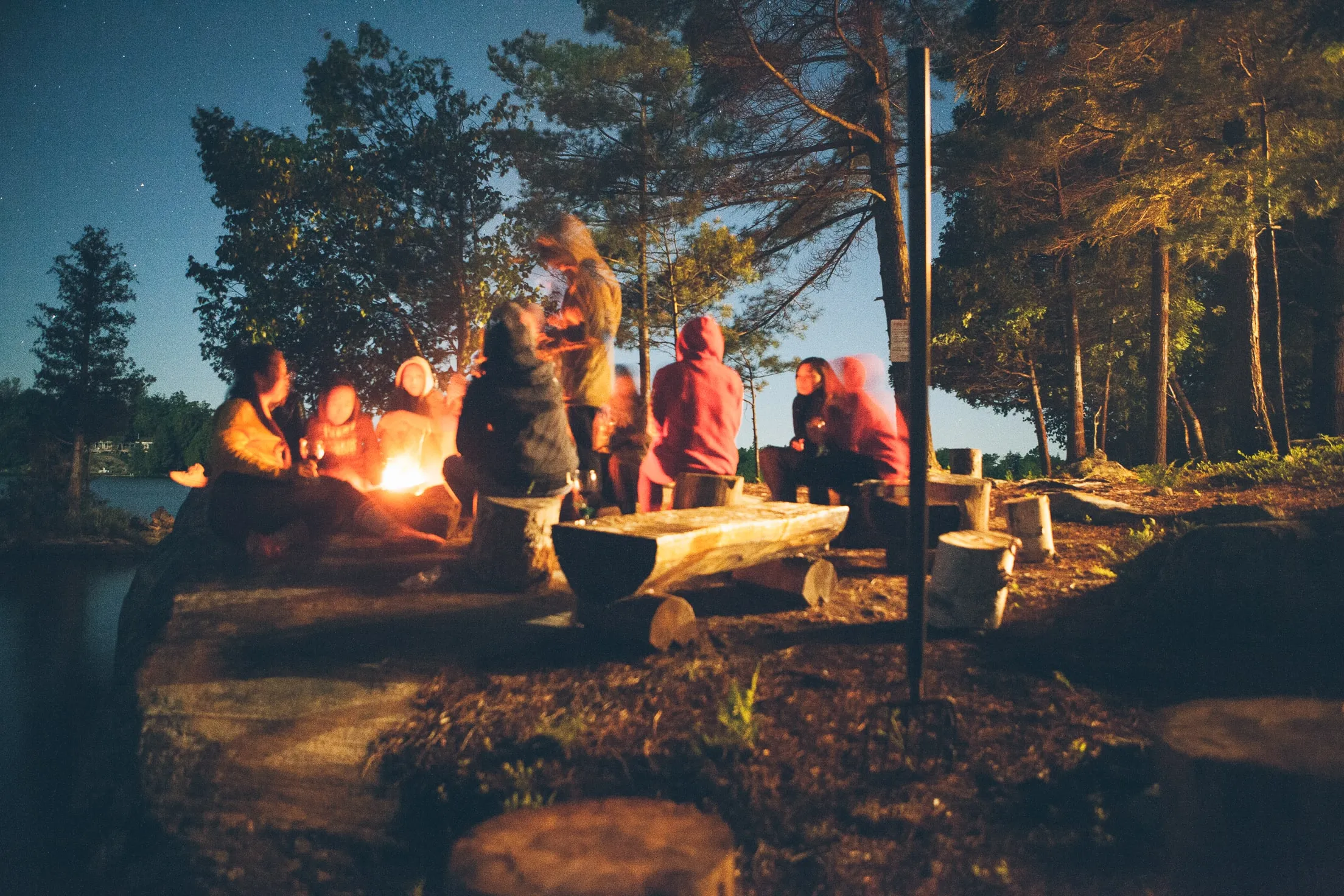 City Students at a campfire retreat